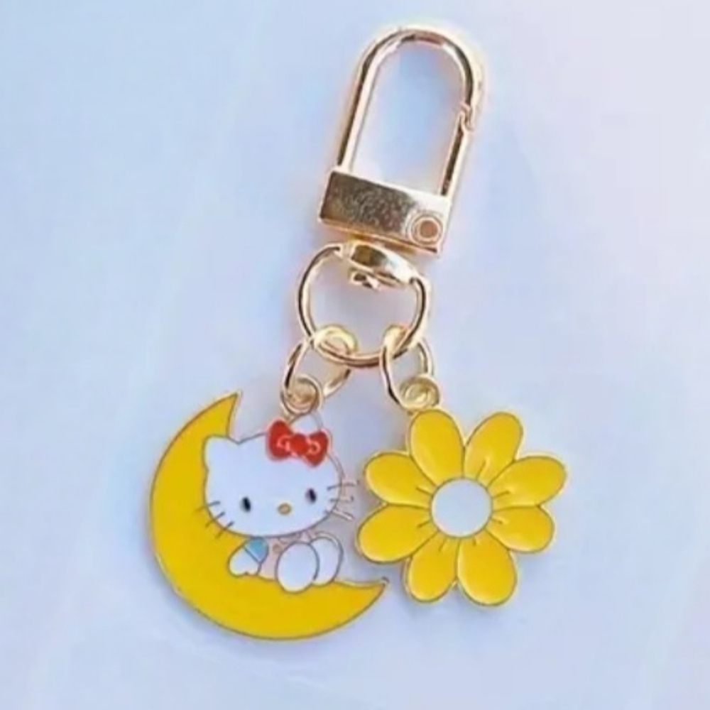 Hello Kitty Keychain Sitting on Crescent Moon